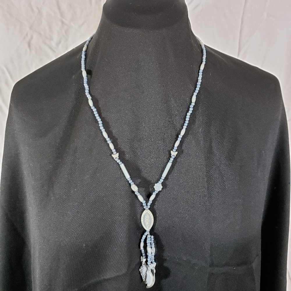 Long blue and cream acrylic bead necklace